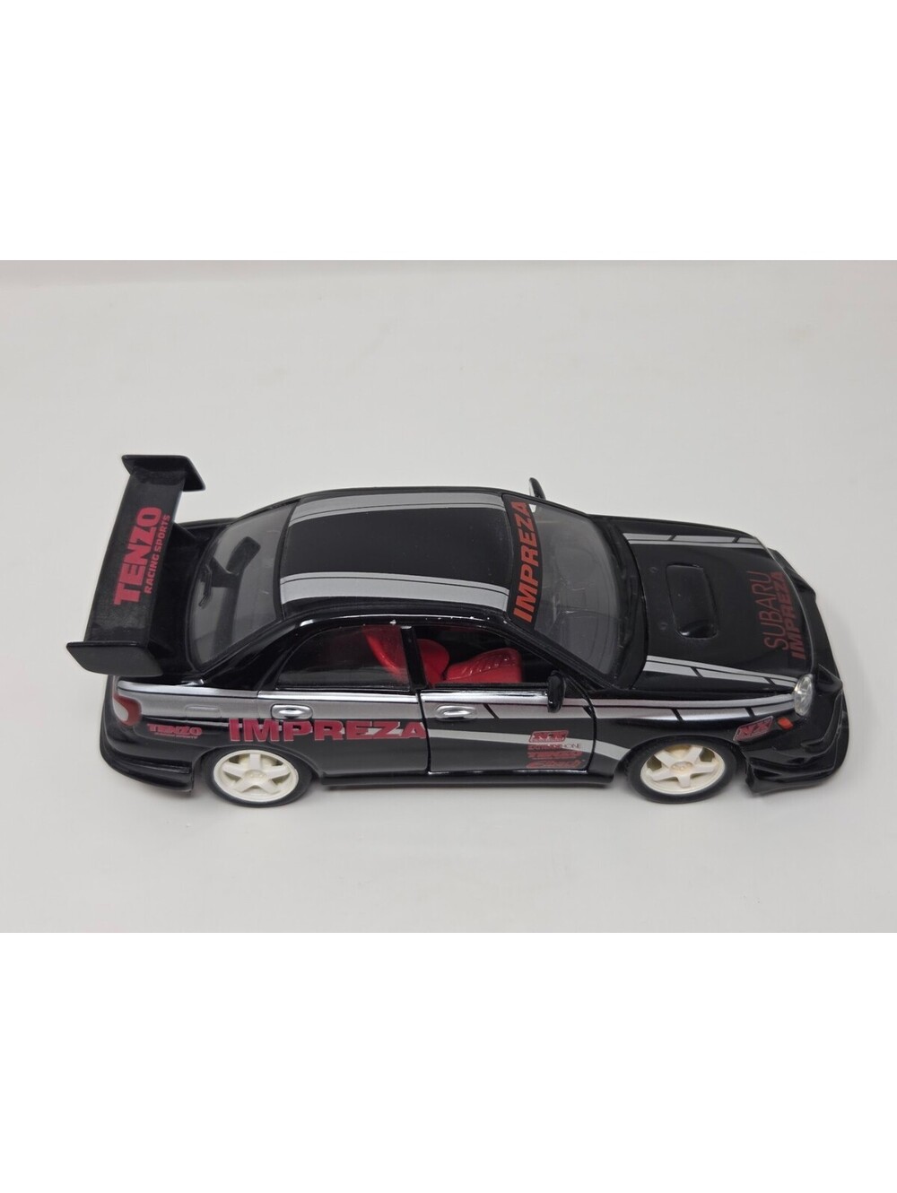 Subaru Impreza 1:24 Scale Die-Cast Model Car Black With Tenzo Racing Decals